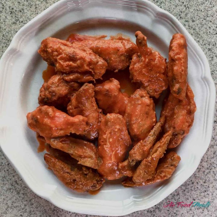 top down view of air fryer buffalo chicken wings