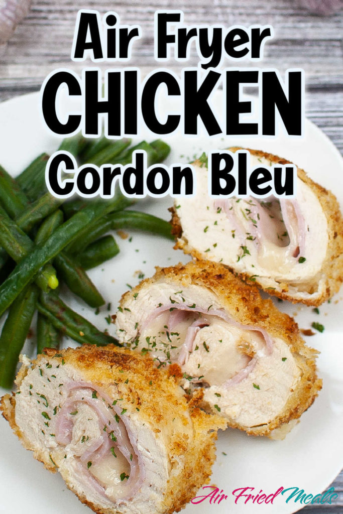 Pin Image: plate with cut up chicken cordon bleu and the words "Air Fryer Chicken Cordon Bleu" overlayed.